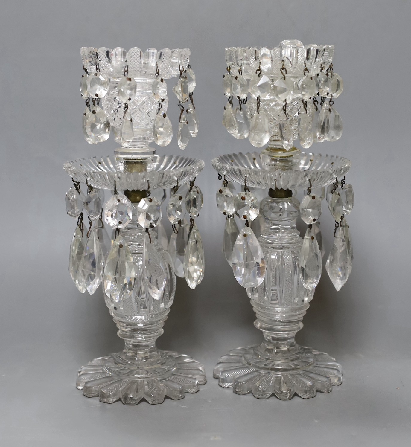 A pair of 19th century two-tier cut glass table lustres. 25.5cm high